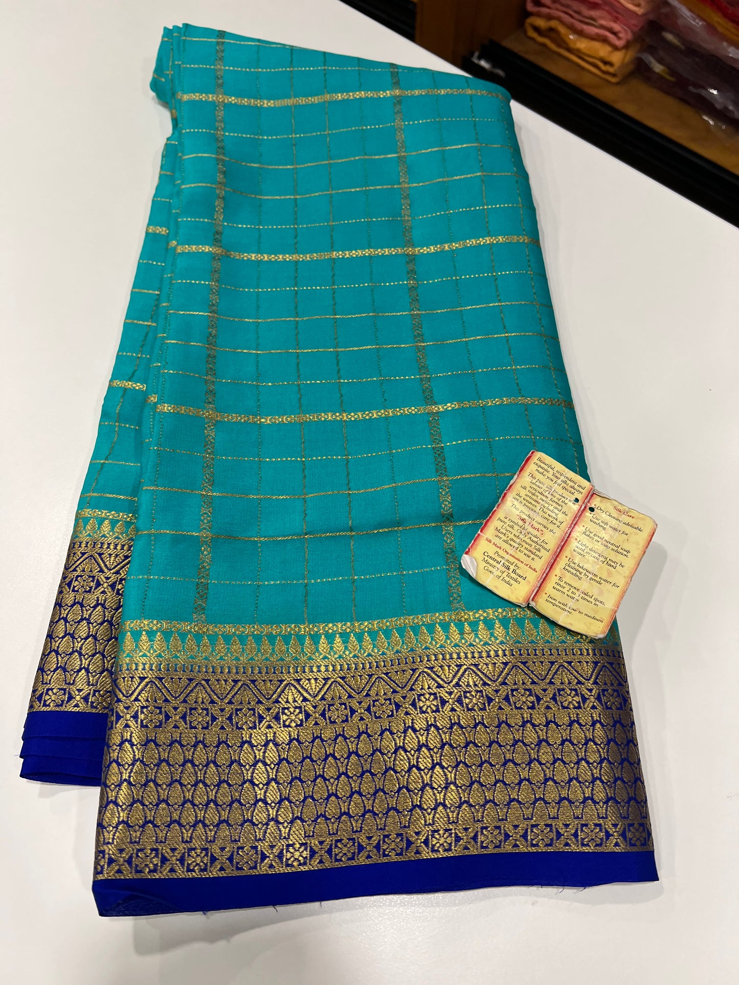 Checks pattern with rich pallu