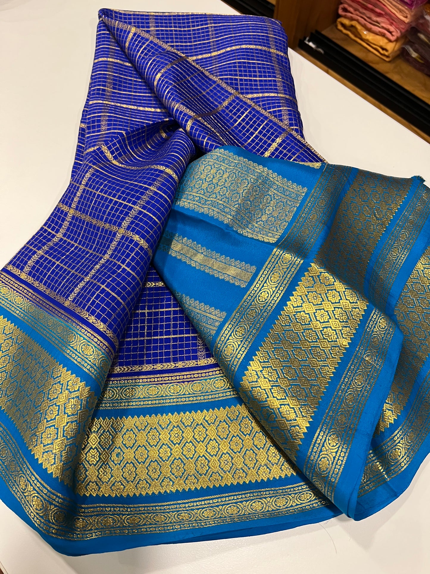 Checks pattern with rich pallu