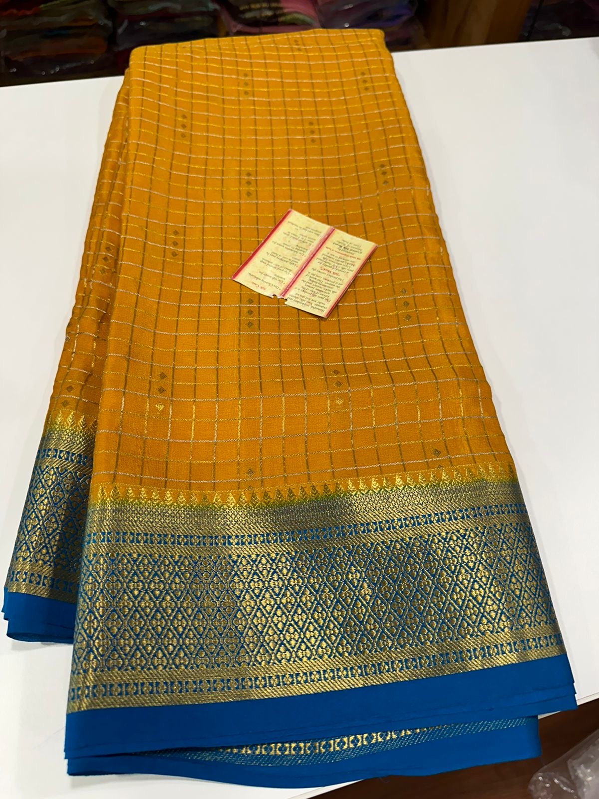 Checks pattern with rich pallu