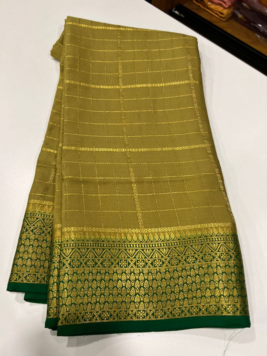 Checks pattern with rich pallu