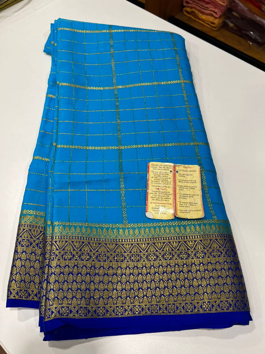 Checks pattern with rich pallu