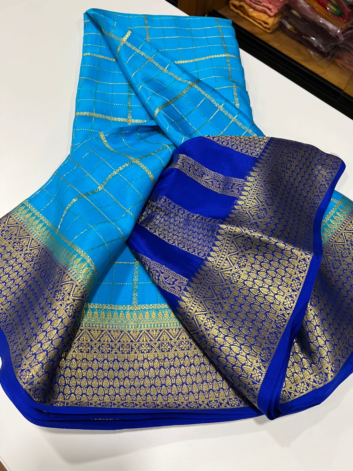 Checks pattern with rich pallu