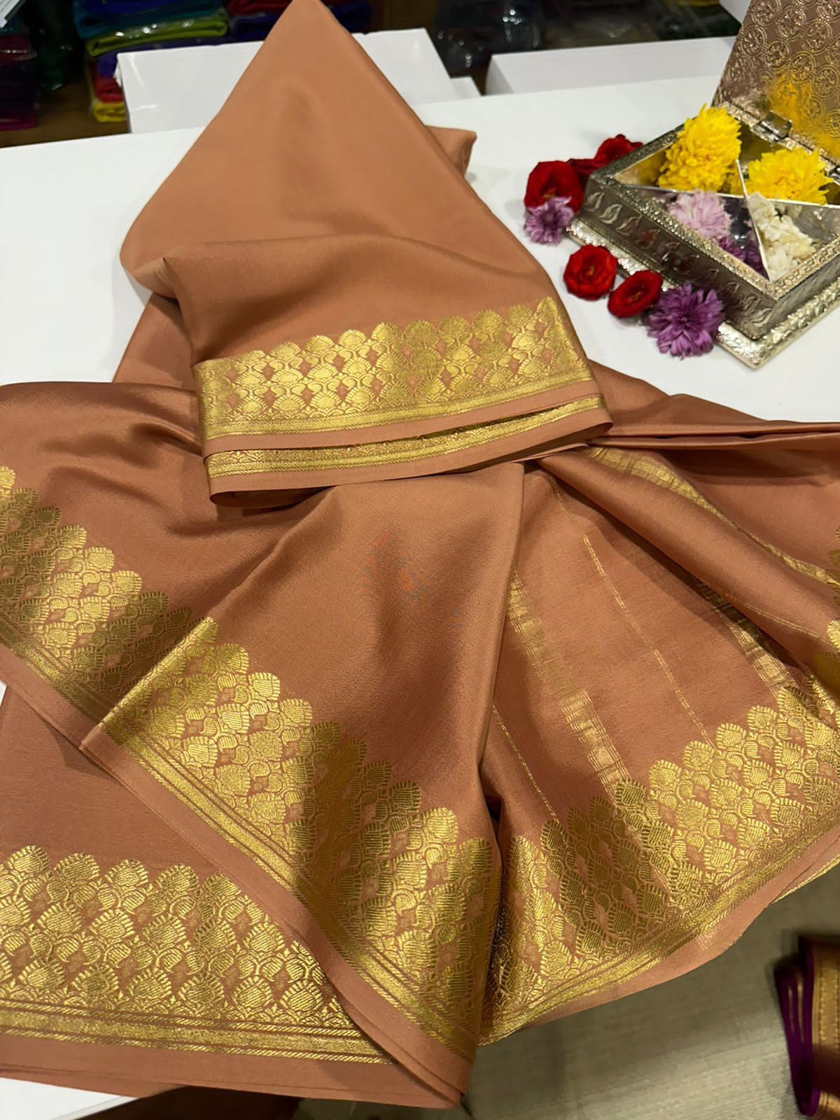 Pure Mysore silk sarees with 100 grm thickness and traditional flower border with beautiful color combinations which comes with elegant colors